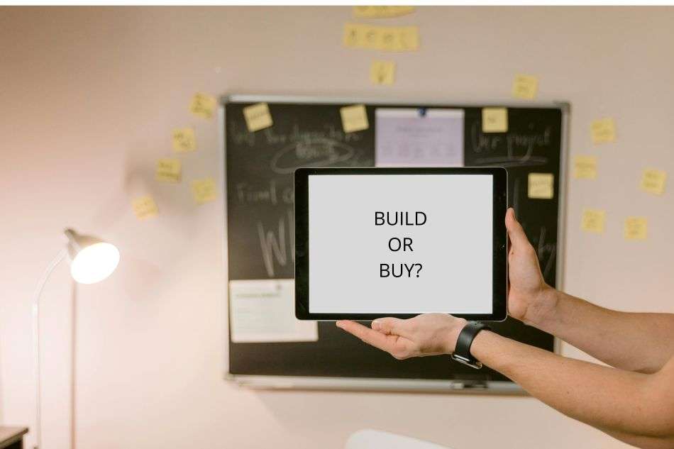 custom vs saas decision shown on a tablet during software product planning