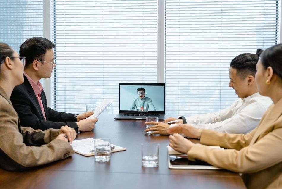 Nearshore software development team collaborating remotely with a business client